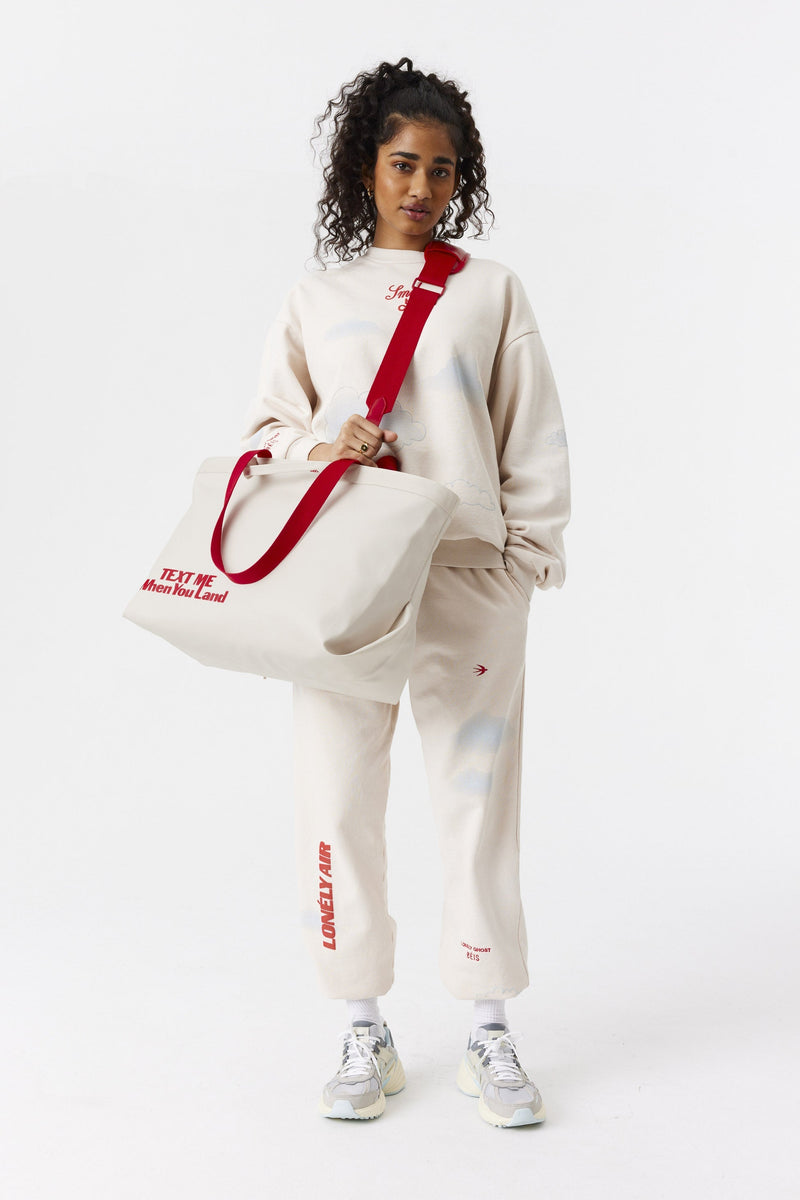 Resale The Travel Tote in Ghost White