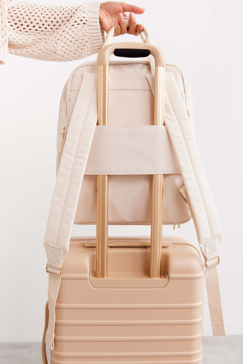 The Expandable Backpack in Beige