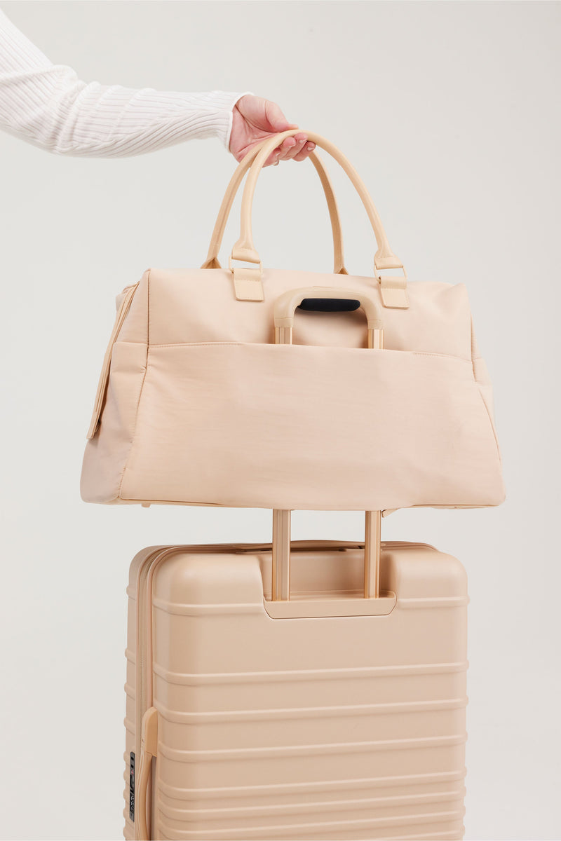 Resale The Commuter Duffle in Beige